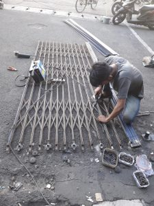 service pintu harmonika depok bergaransi